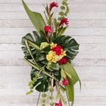 Arrangement funéraire floral - Ginger, monstera, roses, orchidées