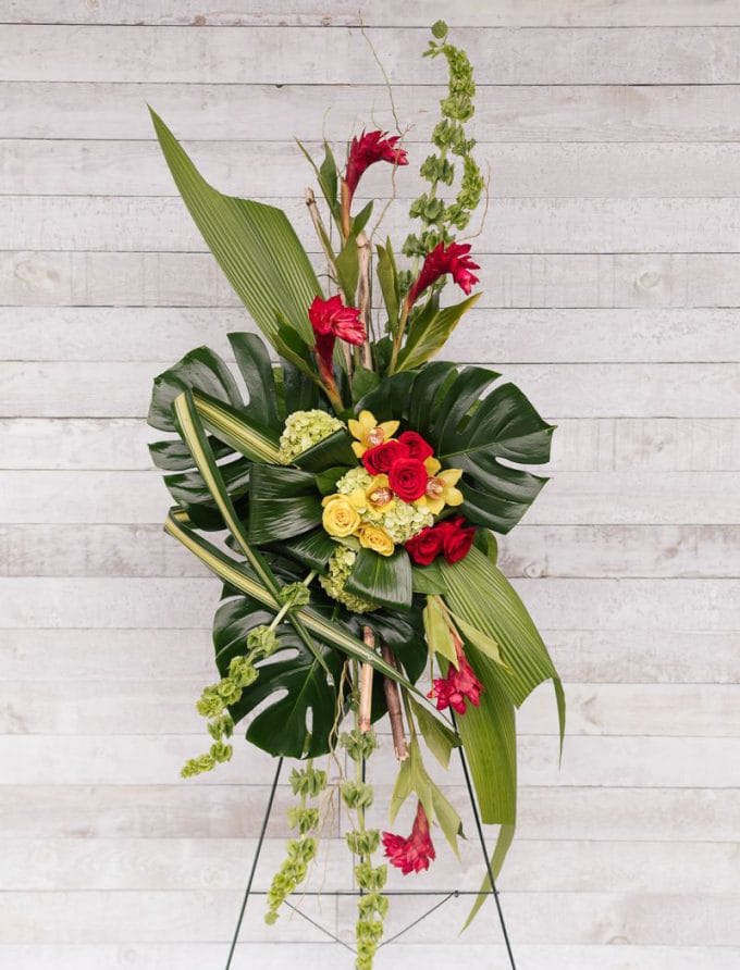 Arrangement funéraire floral - Ginger, monstera, roses, orchidées