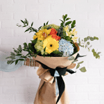Bouquet de fleurs coupées - Gerberas, cymbidium, hydrangées, roses, éryngium, alstroemeria, ruscus, eucalyptus
